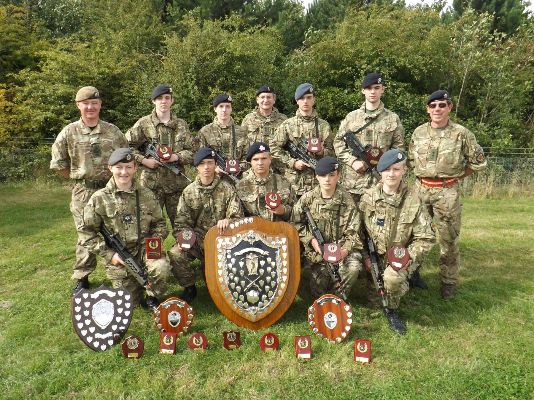  CCF students with trophies