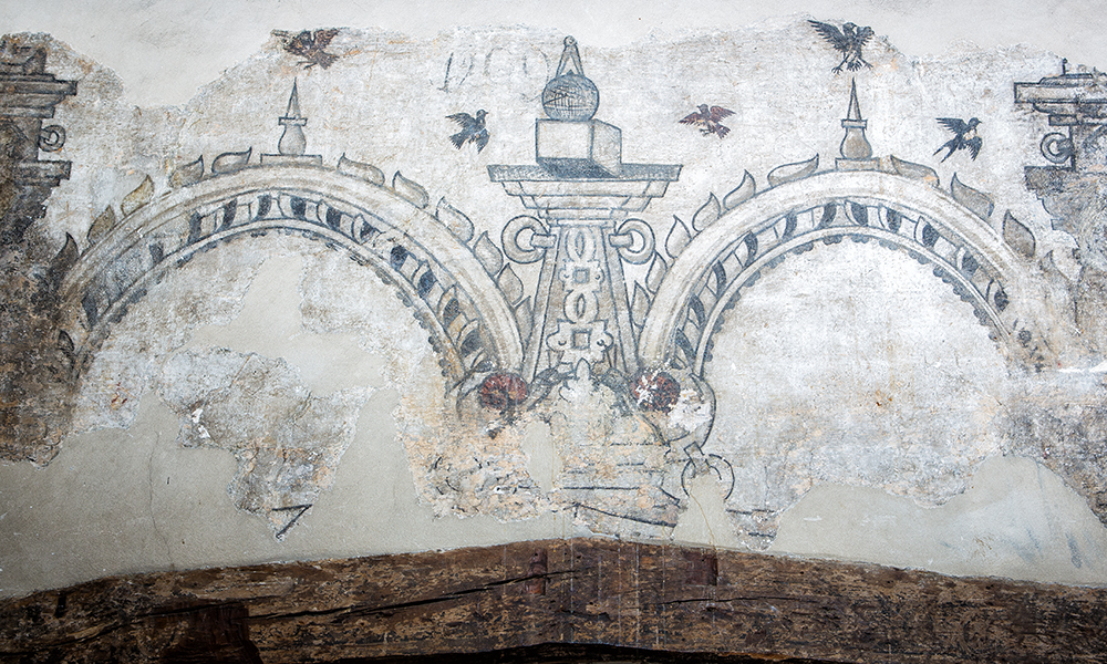  An image from the wall of the library showing two archways